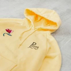 By Parra The Secret Garden Hooded Sweat - Pale Yellow -Kyosho Shop TheSecretGardenHoodedSweat PaleYellow2 6d9efc25 d5a3 4de6 99ca 863ecce23848 1024x1024