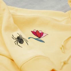 By Parra The Secret Garden Hooded Sweat - Pale Yellow -Kyosho Shop TheSecretGardenHoodedSweat PaleYellow3 e7186494 0695 4026 8ed1 3468cae5a40d 1024x1024